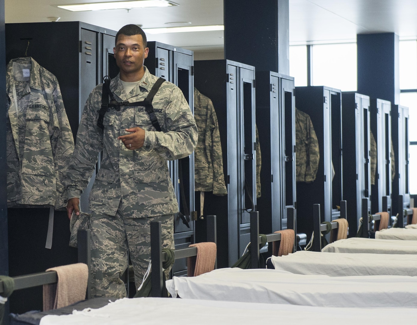 A chaplain candidate tours an Airman Training Complex's dorm at Joint Base San Antonio-Lackland, Texas, July 5, 2017. The tour was part of the Chaplain Candidate Intensive Internship. (U.S. Air Force photo by Senior Airman Krystal Wright)