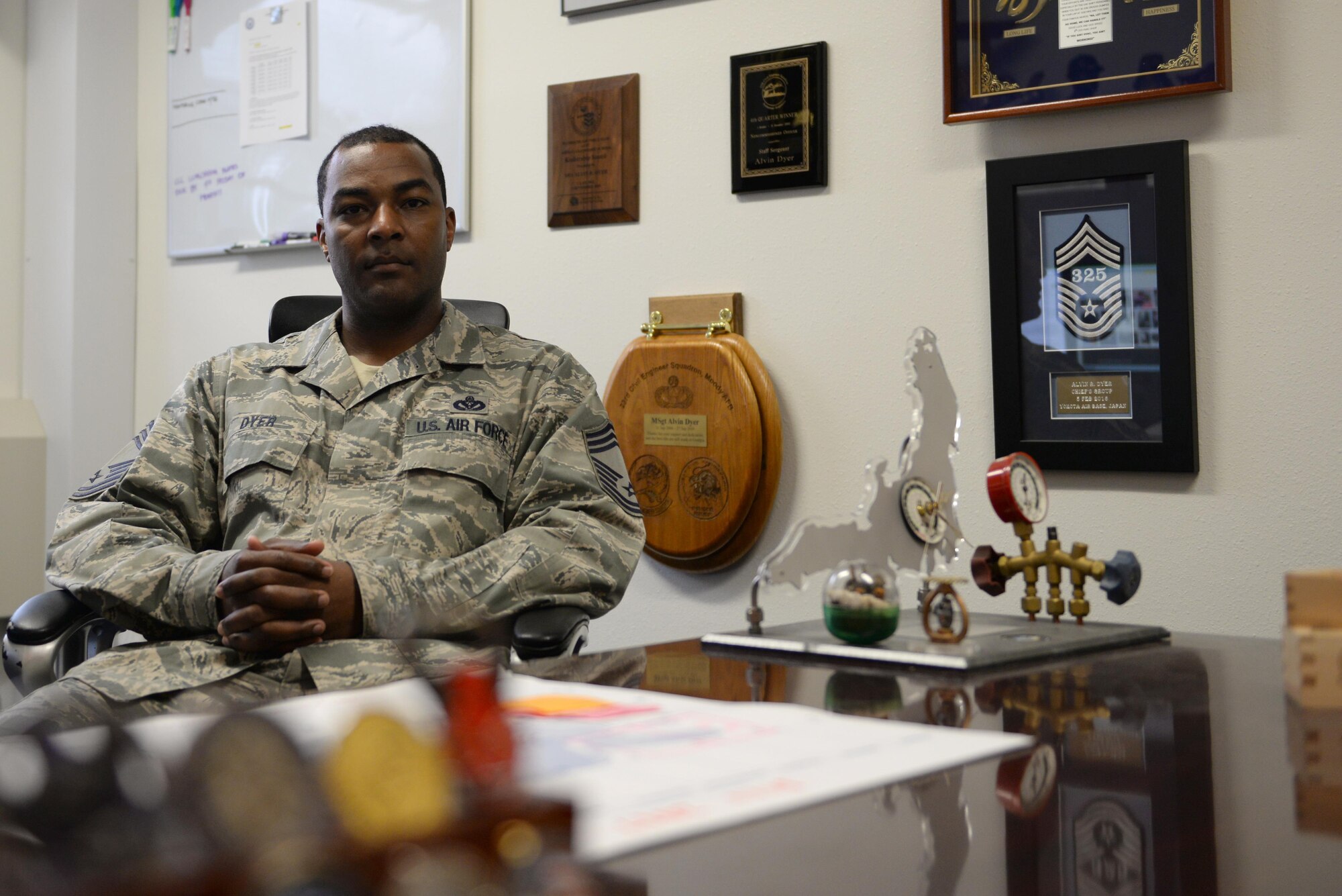 U.S. Air Force Chief Master Sgt. Alvin Dyer, the 354th Civil Engineer Squadron superintendent, poses for a photo in his office July 13, 2017, at Eielson Air Force Base, Alaska. Dyer didn’t always want to become a chief master sergeant, but he said life had different plans for him. (U.S. Air Force photo by Senior Airman Cassie Whitman)