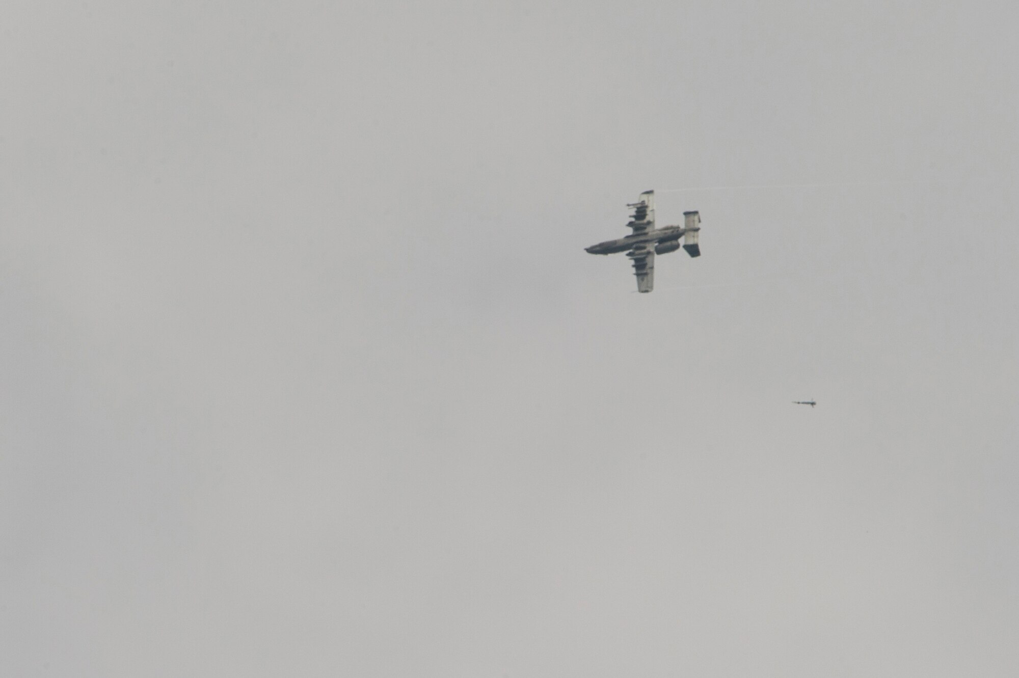 A U.S. Air Force A-10 Thunderbolt aircraft assigned to the 25th Fighter Squadron out of Osan Air Base, South Korea, drops a non-live ordnance on targets June 29, 2017, in the Joint Pacific Alaska Range Complex, Delta Junction, Alaska. The A-10 Thunderbolt II is an accurate and survivable weapons-delivery platform. (U.S. Air Force photo by Airman 1st Class Isaac Johnson)