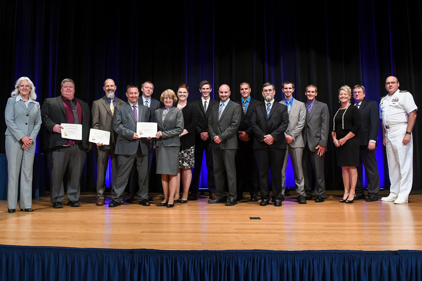The U.S. Navy’s awardees at the Department of Defense’s Value Engineering Achievement Awards pose for a group photo during a ceremony held in the auditorium of the Pentagon in Arlington, Va., July 18, 2017. (U.S. Army Photo by Zane Ecklund)