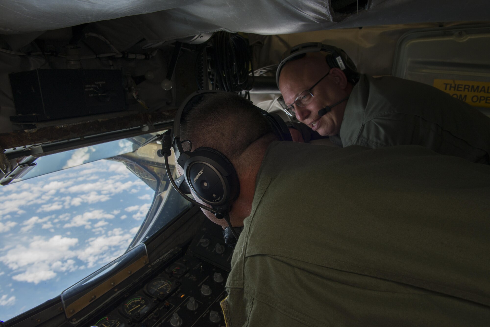 Senior Master Sgt. Aaron Achenbach, alongside Chief Master Sgt. Michael Zimmerman, 328th Air Refueling Squadron, perform in-flight training on a KC-135 Stratotanker, July 18, 2017, Niagara Falls Air Reserve Station, N.Y. Air crew personnel performed various procedures to further familiarize themselves with the new aircraft. The 914th officially became an Air Refueling Wing in June 2017, acquiring a new airframe and mission. (U.S. Air Force photo by Tech. Sgt. Steph Sawyer) 