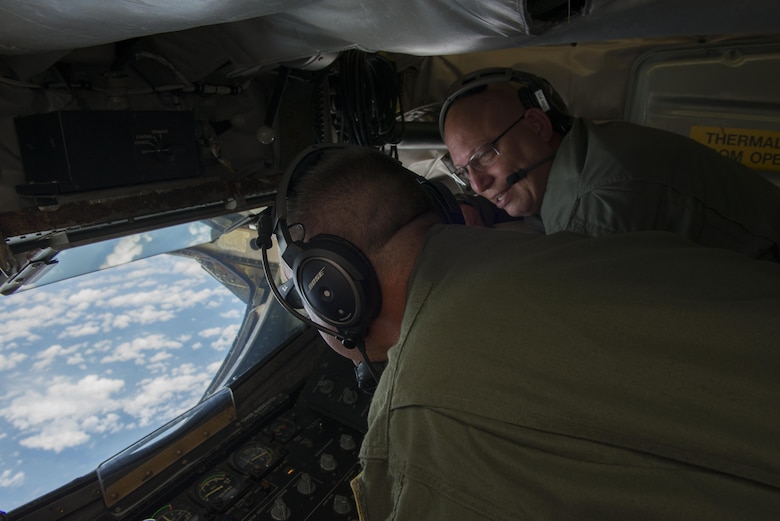 Senior Master Sgt. Aaron Achenbach, alongside Chief Master Sgt. Michael Zimmerman, 328th Air Refueling Squadron, perform in-flight training on a KC-135 Stratotanker, July 18, 2017, Niagara Falls Air Reserve Station, N.Y. Air crew personnel performed various procedures to further familiarize themselves with the new aircraft. The 914th officially became an Air Refueling Wing in June 2017, acquiring a new airframe and mission. (U.S. Air Force photo by Tech. Sgt. Steph Sawyer) 