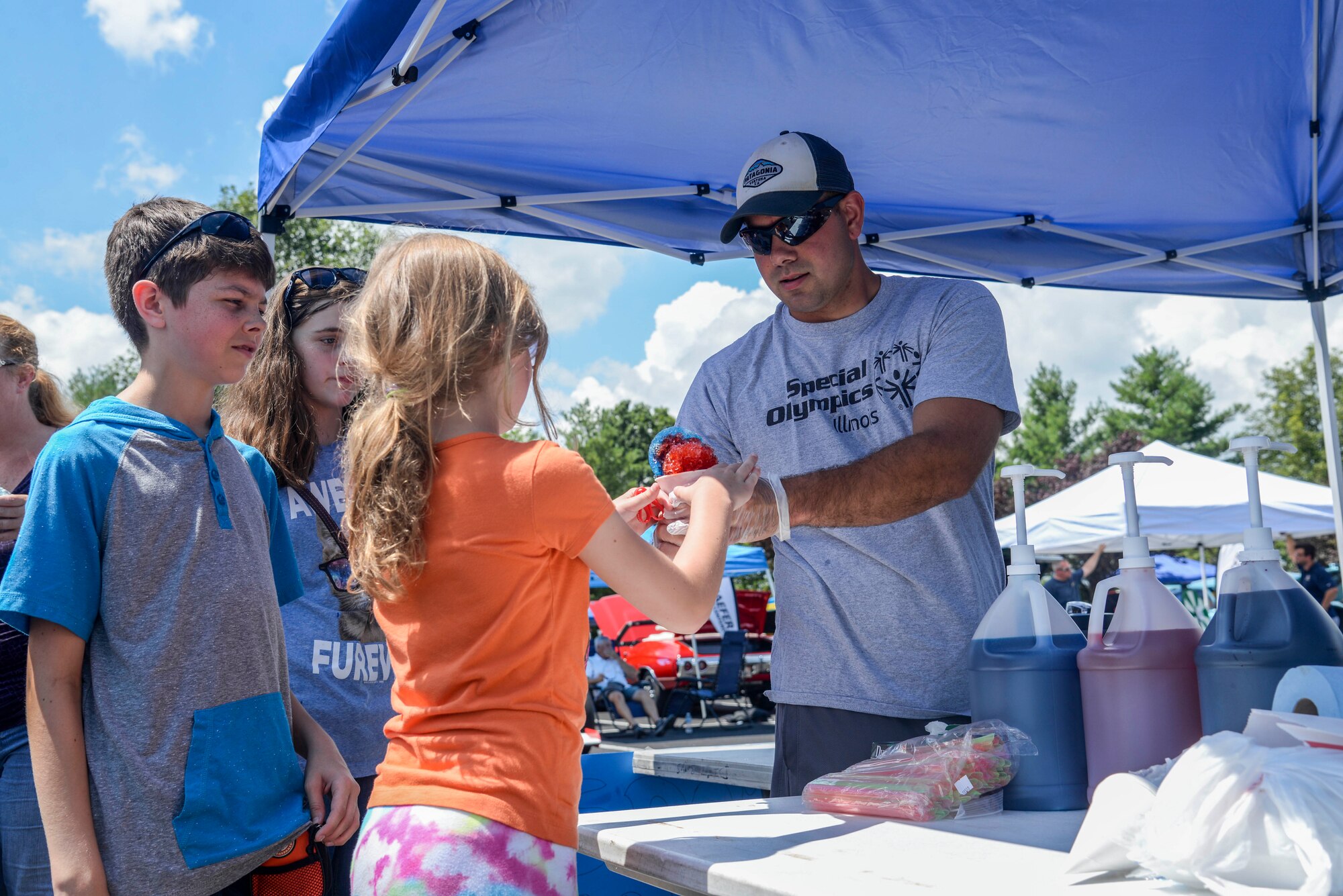 More than 1,000 spectators came to see the Scott Air Force Base Centennial Car Show on July 14 at the Scott Event Center. The show featured unique vehicles from approximately 160 participants. Volunteers from Team Scott served food and refreshments, and augmentees assisted the Security Forces in guiding traffic.