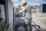A U.S. Airman trains on a concrete cutting chainsaw as a REACT instructor observes at the REACT Center at Volk Field, Wis., July 17, 2017. The PATRIOT North exercise is a Domestic Operations disaster-response training exercise conducted by National Guard units working with federal, state and local emergency management agencies and first responders. 