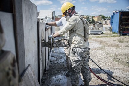 A U.S. Airman trains on a concrete cutting chainsaw as a REACT instructor observes at the REACT Center at Volk Field, Wis., July 17, 2017. The PATRIOT North exercise is a Domestic Operations disaster-response training exercise conducted by National Guard units working with federal, state and local emergency management agencies and first responders. 