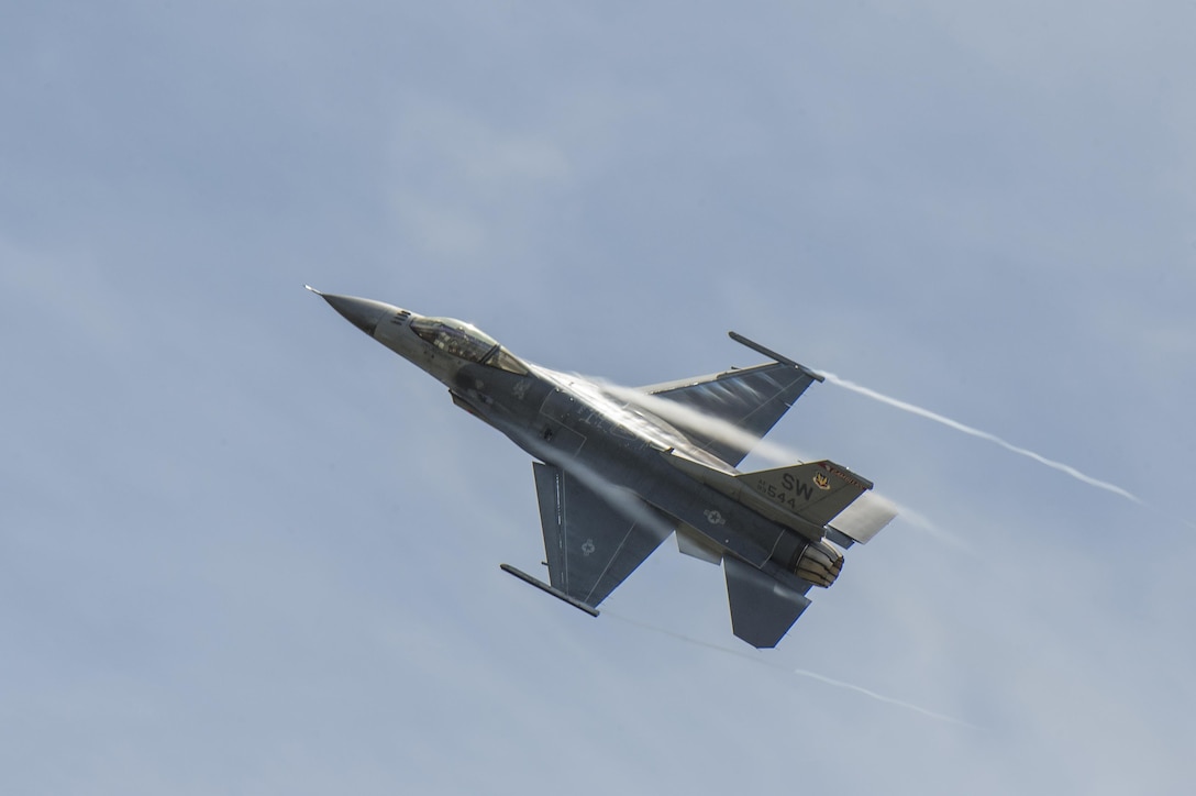 A U.S. Air Force F-16CM Fighting Falcon soars over the F-AIR COLOMBIA 2017 air show in Rionegro, Colombia, July 14, 2017. The U.S. Air Force supported the nation’s bi-annual air show by providing six aircraft to be used for static displays and aerial demonstrations. (U.S. Air Force photo by Staff Sgt. Zade Vadnais)