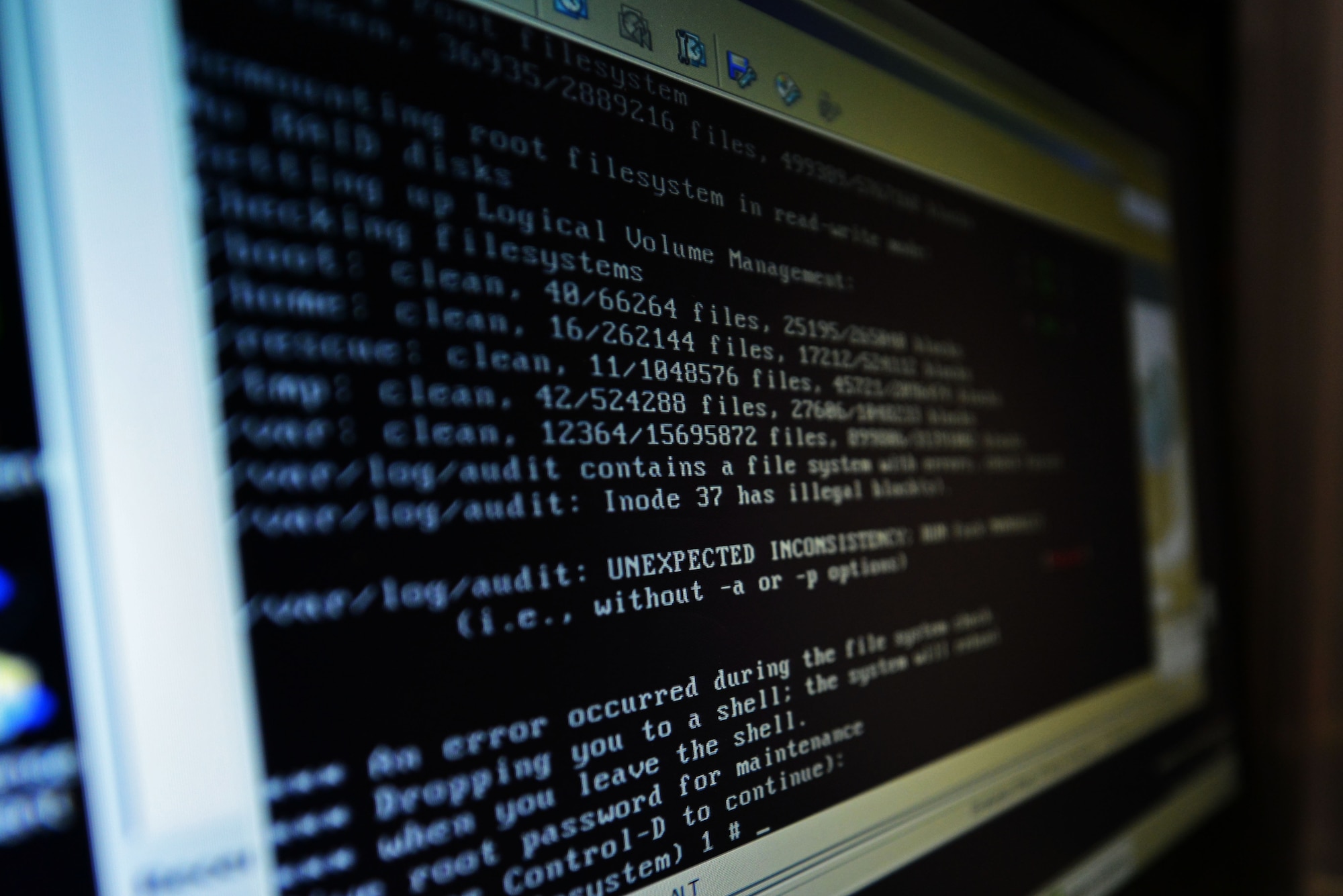 Lines of coding run on a computer screen as Jimmie De Armes, field engineer, increases the security of the Enhanced 911 (E-911) system at Shaw Air Force Base, S.C., July 11, 2017. The E-911 system allows emergency responders to pinpoint the location of a 911 emergency call, cutting down their response time. (U.S. Air Force photo by Airman 1st Class Destinee Sweeney)