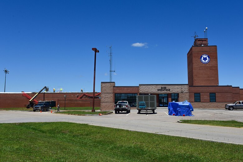 Civilian contractors work on renovation projects at various locations around McEntire Joint National Guard Base, S.C., June 8, 2017. Select buildings and runway sections are undergoing renovations designed and contracted by the 169th Civil Engineer Squadron which will aid training missions of Swamp Fox Airmen. (U.S. Air National Guard photo by Senior Airman Megan Floyd)