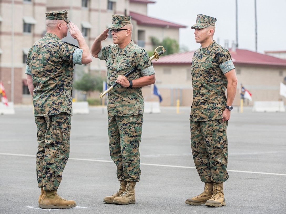 Sergeant Major Slattery retires from the U.S. Marine Corps after 30 years of faithful service and passes his duties and responsibilities as 3d Assault Amphibian Battalion to Sgt. Maj. Garcia on May 5, 2017, at Camp Pendleton, Calif.