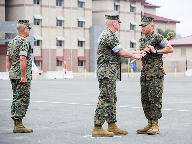 Sgt. Maj. Slattery passes the torch to Sgt. Maj. Garcia