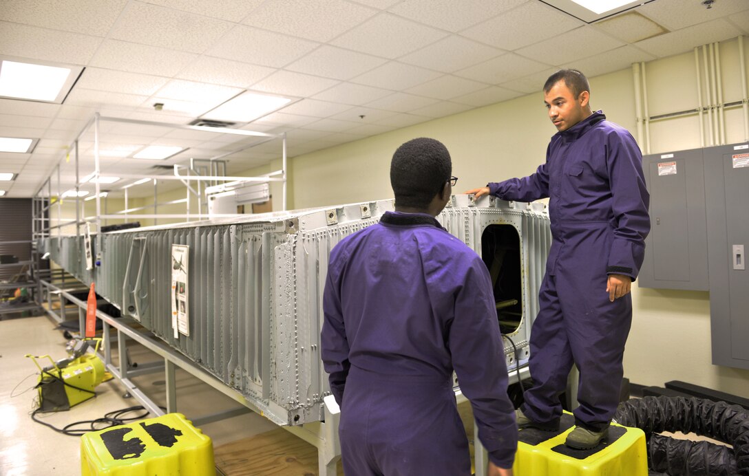 Airmen Malik Jackson and Victor Mendoza 361st Training Squadron aircraft fuel systems apprentice course students learn to diagnose and repair fuel system malfunctions at Sheppard Air Force Base, Texas. This training ensures that any malfunction problems are corrected before the aircraft takes off.  (U.S. Air Force photo/Liz H. Colunga)