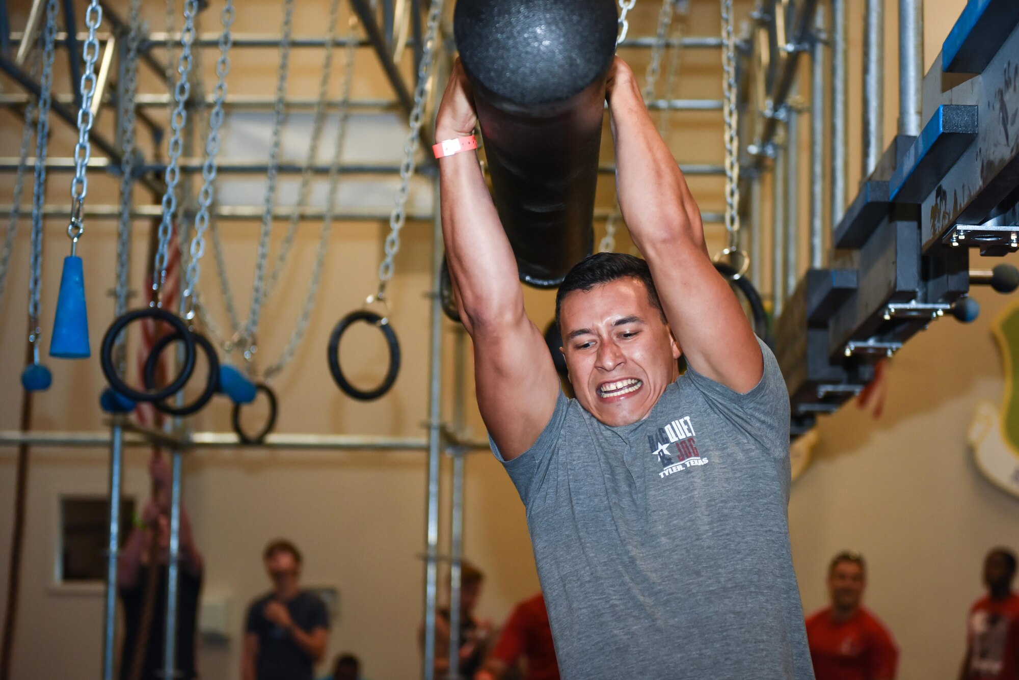 A member of Team Barksdale participates in the Alpha Warrior course at Barksdale Air Force Base, La., July 11, 2017. Alpha Warrior provides both training and application of obstacle fitness for civilians and military around the world. (U.S. Air Force photo/Airman 1st Class Stuart Bright)