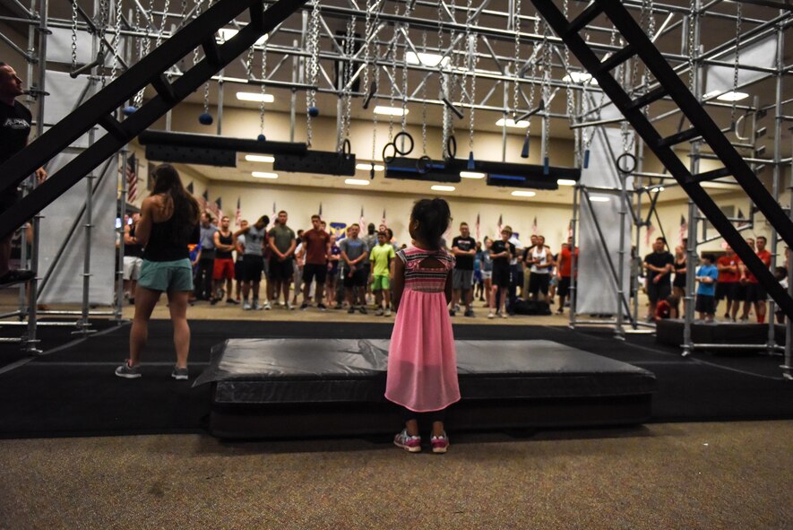 Members of Alpha Warrior explain the course to competitors and supporters at Barksdale Air Force Base, La., July 11, 2017. Some of the Alpha Warriors were competitors on the television show American Ninja Warrior. (U.S. Air Force photo/Airman 1st Class Stuart Bright)