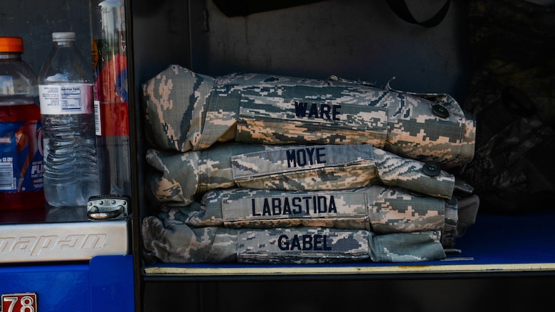 Airman Battle Uniform blouses are stacked near a tool box during a quarterly weapons load competition at Barksdale Air Force Base, La., July 7, 2017. The load crew members were selected by the unit flight chiefs representing their respective aircraft maintenance unit. (U.S Air Force photo/Staff Sgt. Benjamin Raughton)
