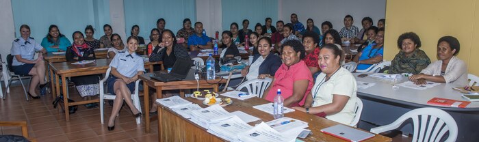 U.S. Air Force Capts. Amber Britt, left, and Paola Rosa, center, pose for a photo with Fijian healthcare professionals during a subject matter exchange in Ba, Fiji, July 14, 2017. The exchange was part of this year’s iteration of Pacific Angel 2017 enhancing partnerships across the Indo-Asia-Pacific region. Britt is a public health officer with the 18th Aerospace Medicine Squadron at Kadena Air Base, Japan, and Rosa is an obstetrician and gynecologist with the 35th Surgical Squadron at Misawa Air Base, Japan. (U.S. Air Force photo by Tech. Sgt. Benjamin W. Stratton)