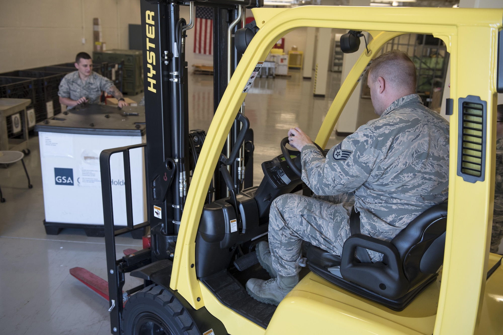 U.S. Air Force U.S. Air Force Airman 1st Class Brett Silverman and Staff Sgt. Jared Bland, 18th Medical Support Squadron medical logistics technicians, load a pallet of supplies onto a forklift during a medical material distribution exercise July 13, 2017, at Kadena Air Base, Japan. During the exercise, 18th MDSS Airmen were challenged to meet the demands of their regular customers for real-world operations and respond to simulated crises throughout the Pacific. (U.S. Air Force photo by Senior Airman John Linzmeier)