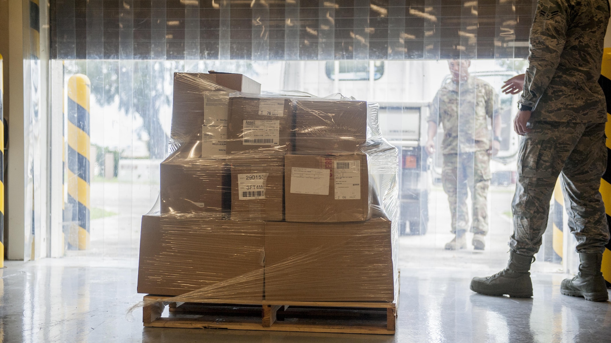 Members from the 18th Medical Support Squadron and the 1-1 Special Forces Group prepare pallets of medical supplies for transport during a Theater Lead Agent for Medical Materiel – Pacific (TLAMM-P) joint exercise July 13, 2017, at Kadena Air Base, Japan. The TLAMM-P is the central medical supply hub for PACOM contingency exercises such as Cobra Gold, Pacific Partnerships, Key Resolve and Foal Eagle. (U.S. Air Force photo/ Airman 1st Class Greg Erwin)