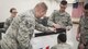U.S. Air Force 18th Medical Support Squadron members label and pack a crate of medical supplies during the Theater Lead Agent for Medical Materiel – Pacific (TLAMM-P) joint exercise July 14, 2017, at Kadena Air Base, Japan. Medical missions throughout the island depend on the 18th MDSS in order to function, such as the Neonatal Intensive Care Unit at Camp Foster, which cares for premature born infants, or the 18th Aerospace Evacuation Squadron, which transports patients to higher medical care. (U.S. Air Force photo/ Airman 1st Class Greg Erwin)
