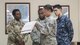 U.S. Air Force Tech. Sgt. Danyelle Saboy, 18th Medical Support Squadron medical logistics technician, briefs U.S. Staff Sgt. Dante Collins, U.S. Navy Petty Officer 3rd Class Augstine Elango, and U.S. Army Specialist Shantasia Johnson, members of the U.S. Pacific Command Armed Services Blood Bank Center during a Theater Lead Agent for Medical Materiel – Pacific (TLAMM-P) joint exercise July 14, 2017, at Kadena Air Base, Japan. To ensure all U.S. forces on Okinawa are ready to fight at a moment’s notice, the 18th MDSS provides medical supplies to all DoD service members, dependents and civilians. (U.S. Air Force photo/ Airman 1st Class Greg Erwin)