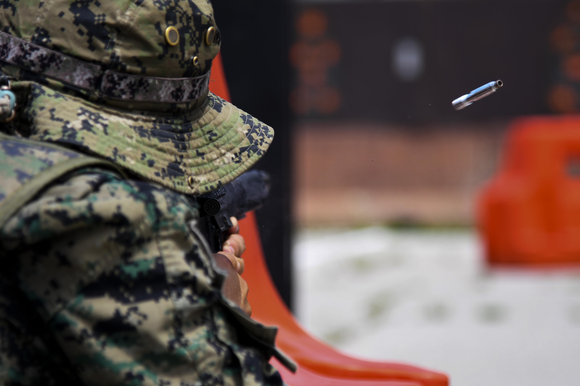 A ROK Special Forces member shoots at a target during joint combat training at Osan Air Base, Republic of Korea, July 19, 2017.  This joint training was integrated as a way to boost unity between the U.S. and South Korean alliance. The training was split into a three session rotation with translators at each station to increase learning capabilities. (U.S. Air force photo by Airman 1st Class Gwendalyn Smith)