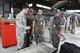 U.S. Air Force Staff Sgt. Joseph Kern, 309th Aircraft Maintenance Group depot aircraft structural maintenance craftsman, shows Republic of Korea Air Force Col. Cha, Jun Seon, 38th Fighter Group commander, a sample of corrosion found on an F-16 Fighting Falcon at Kunsan Air Base, ROK, July 18, 2017. Cha took part in an immersion to help leadership of U.S. and ROKAF gain a better understanding of one another’s assets and what each brings to their partnership. (U.S. Air Force photo by Senior Airman Michael Hunsaker/Released)