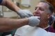 Col. David Eaglin, 39th Air Base Wing commander, bites down for a mouth guard during a dental exercise July 18, 2017, at Incirlik Air Base, Turkey. The exercise demonstrated the process for creating mouth guards. (U.S. Air Force photo by Airman 1st Class Kristan  Campbell)
