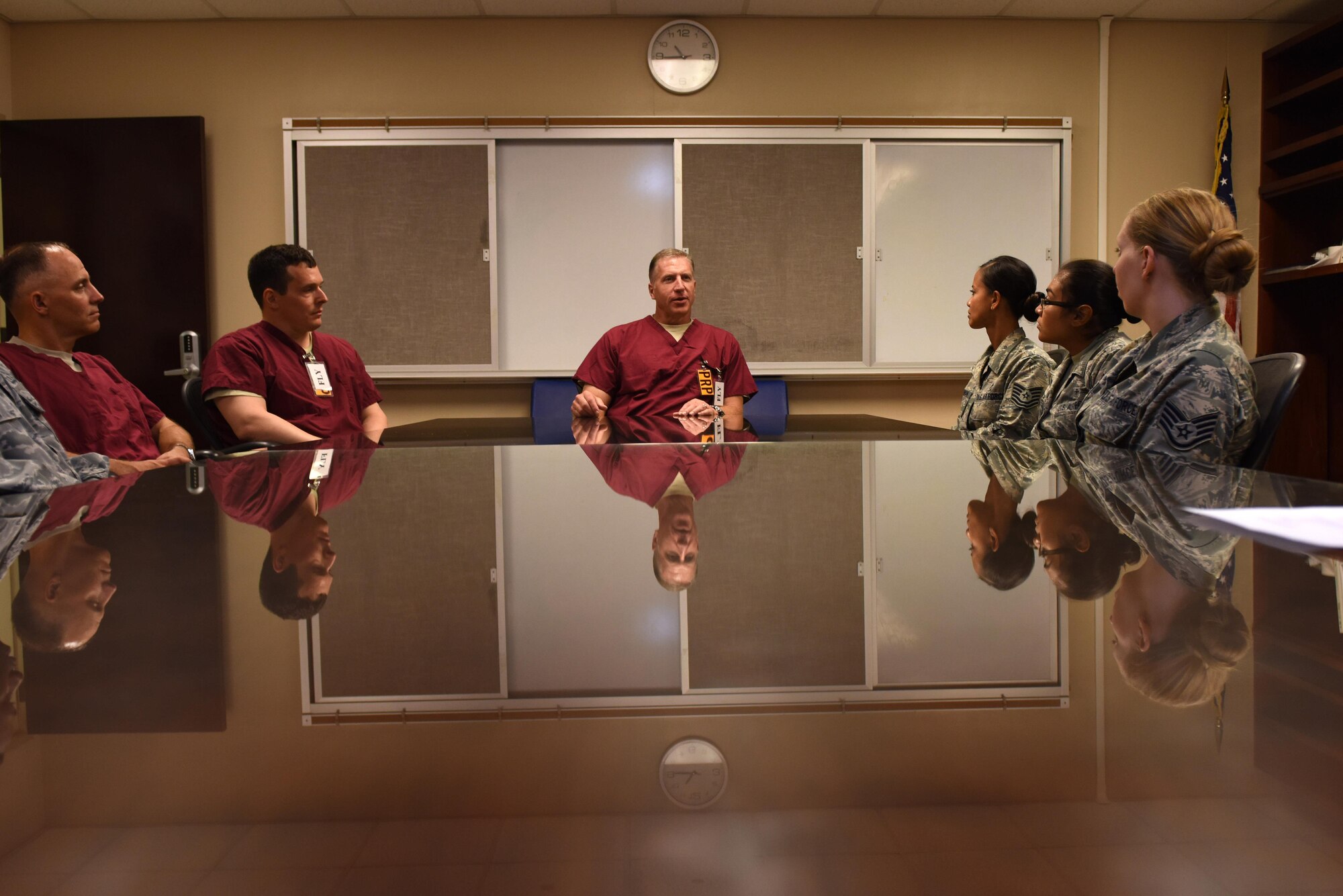 Col. David Eaglin (center), 39th Air Base Wing commander, Col. Michael Rimsky (third from left), 39th ABW vice commander, and Chief Master Sgt. Thomas Cooper (second from left), 39th ABW command chief, solicit feedback from dental personnel during a meeting July 18, 2017, at Incirlik Air Base, Turkey. At the meeting, Eaglin answered questions involving Airmen morale and readiness. (U.S. Air Force photo by Airman 1st Class Kristan  Campbell)