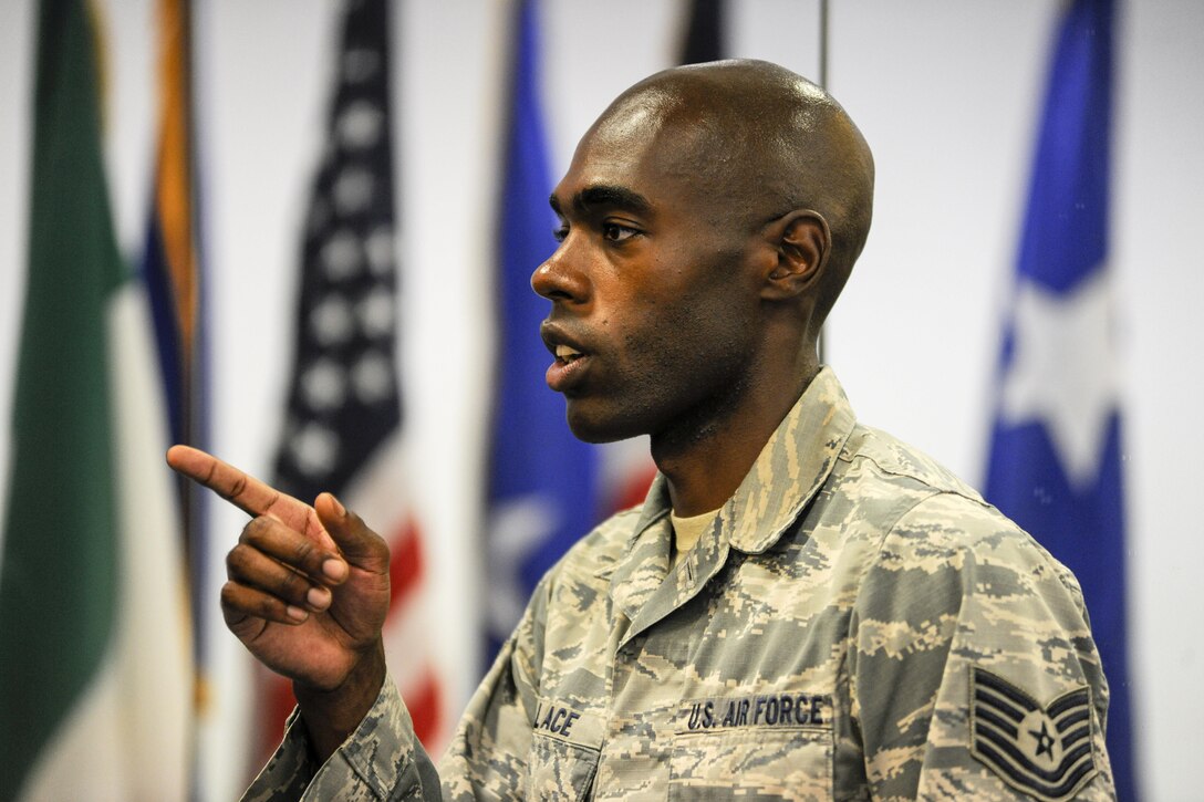 Tech. Sgt. Martin Wallace, 31st Fighter Wing Honor Guard lead instructor, instructs Airmen during a base honor guard practice July 10, 2017, at Aviano Air Base, Italy. Wallace has served as a base honor guardsman since he was an Airman 12 years ago. (U.S. Air Force photo by Senior Airman Cory W. Bush)