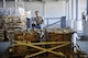 Tech. Sgt. William Anderson, an Airman from the 81st Aerial Port Squadron, Joint Base Charleston, loads a pallet of hazardous cargo onto a weigh-station in the special handling section at Ramstein Air Base, Germany, July 19, 2017. Anderson, along with fellow Airman from the 81st APS, completed annual tour training requirements while in Germany.  (U.S. Air Force photo by Senior Airman Jonathan Lane)