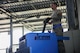 Tech. Sgt. William Anderson, an Airman from the 81st Aerial Port Squadron, Joint Base Charleston, loads a pallet of hazardous cargo on a weigh-station in the special handling section at Ramstein Air Base, Germany, July 19, 2017.  Anderson, along with fellow Airmen from the 81st APS, completed annual tour training requirements while in Germany.
  (U.S. Air Force photo by Senior Airman Jonathan Lane)