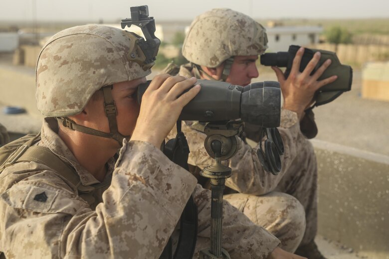 U.S. Marines with Task Force Southwest search for enemy activity during Operation Maiwand Four at Camp Shorserack, Afghanistan, July 17, 2017. Advisors from the Task Force assisted their Afghan National Defense and Security Force partners during the operation, which saw elements of the Afghan National Army 215th Corps, 505th Zone National Police and several other forces establish security in the Nawa district center. The U.S. and Afghan forces will continue to work together in order to enhance stability and establish governance in the area. (U.S. Marine Corps photo by Sgt. Lucas Hopkins)