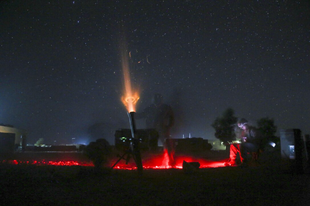 U.S. Marines with Task Force Southwest fire a non-explosive illumination round from an 81mm mortar to deter enemy activity at Camp Shorserack, Afghanistan, July 15, 2017. Advisors assigned to the Task Force assisted their Afghan National Defense and Security Force partners complete Operation Maiwand Four, which saw elements of the Afghan National 215th Corps, 505th Zone National Police and other forces successfully clear the Nawa district center of insurgents. (U.S. Marine Corps photo by Sgt. Lucas Hopkins)