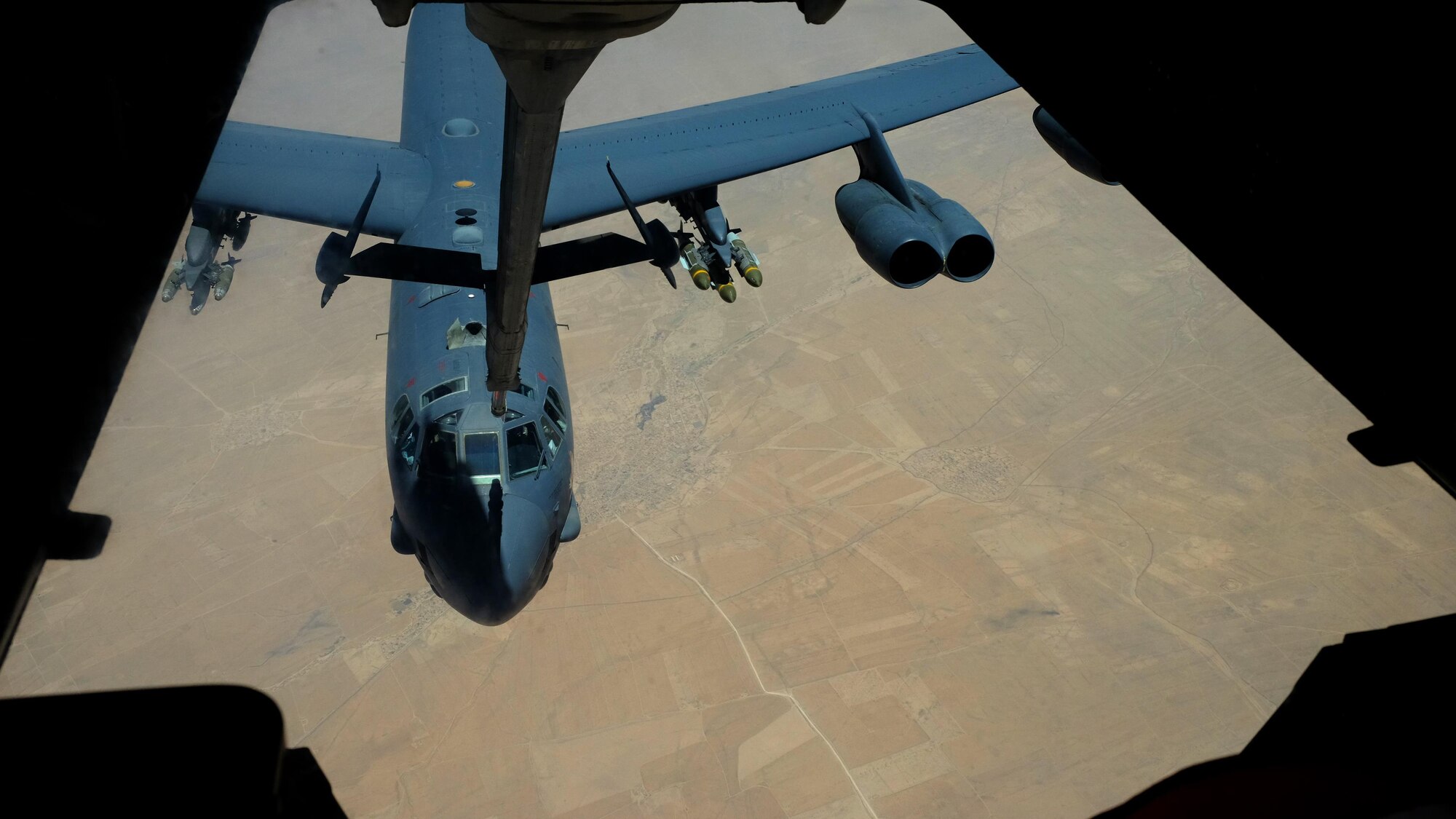 A B-52 Stratofortress prepares to receive fuel from a KC-10 Extender with the 908th Expeditionary Air Refueling Squadron July 19, 2017, over an undisclosed location in southwest Asia. Since January, 908th EARS crews have dedicated more than 15,000 flight hours, offloading more than 160 million pounds of fuel to nearly 15,000 Coalition aircraft and supporting almost 7,500 strategic strikes against ISIS. (U.S. Air Force photo by Senior Airman Preston Webb)