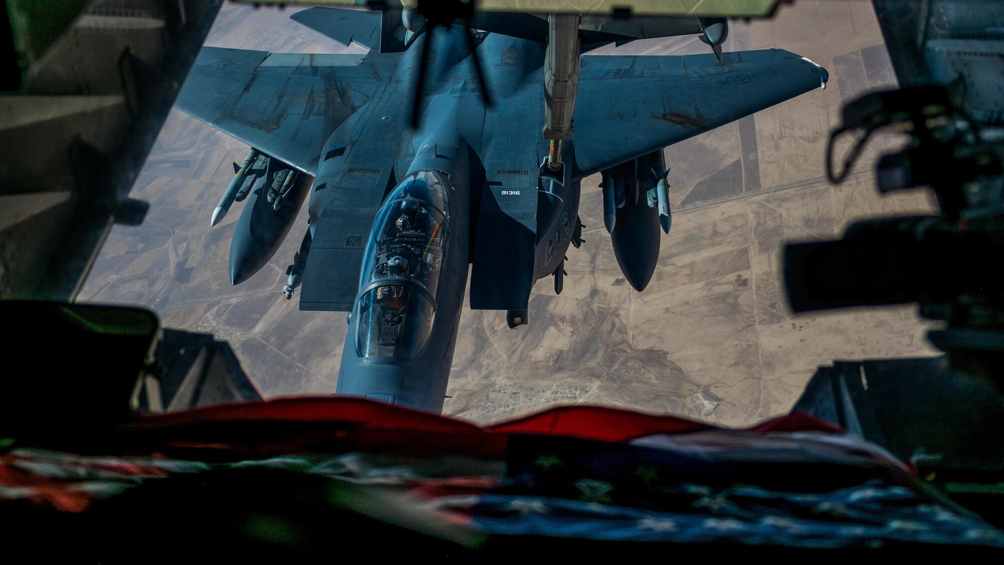 An F-15E Strike Eagle receives fuel from a KC-10 Extender with the 908th Expeditionary Air Refueling Squadron July 19, 2017, over an undisclosed location in southwest Asia. The F-15E is a dual-role fighter designed to perform air-to-air and air-to-ground missions. (U.S. Air Force photo by Senior Airman Preston Webb)