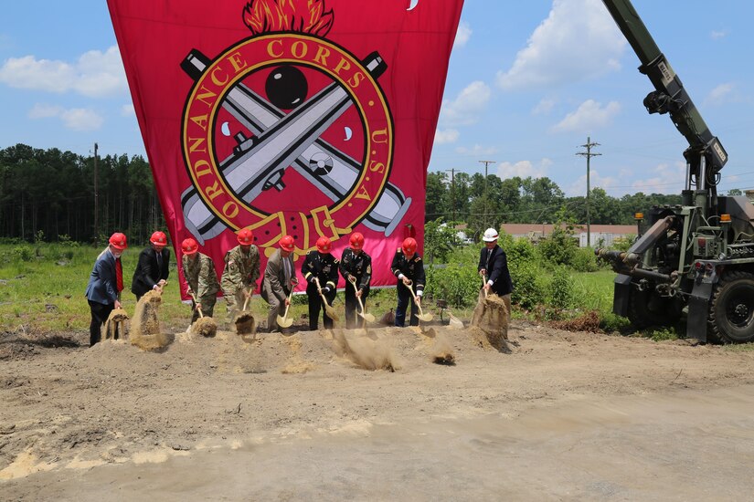 Ordnance Corps, Fort Lee, Norfolk District and other Army leaders ceremoniously shovel the first dirt for the construction of the new Ordnance Training Support Facility. The center will house ordnance historical collections and focus on providing training to Ordnance Soldiers. (U.S. Army photo/Chris Hart)