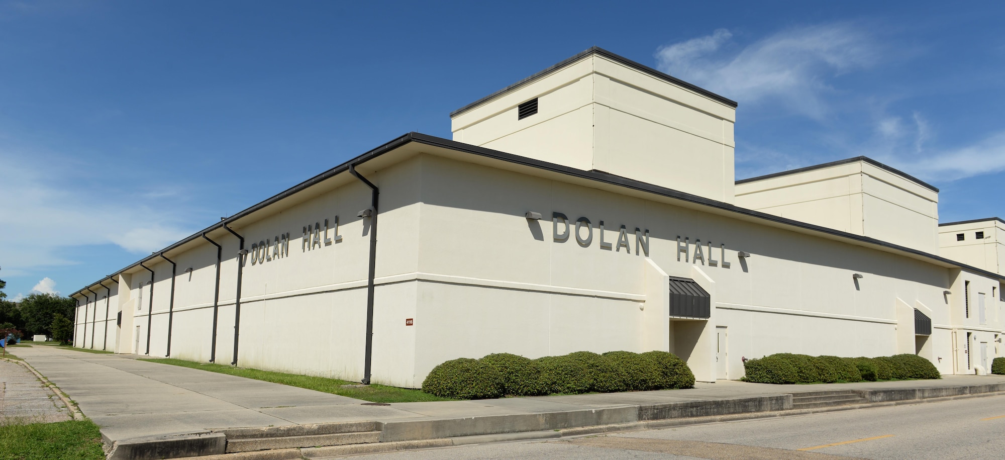 Dolan Hall is located on Hangar Rd. and D St., Bldg. 4115. Today, thousands of Airmen from the 333rd, 334th, 336th, and 338th Training Squadrons pass through this building annually and take what they learn and apply it at their next base. Dolan Hall also houses the Sexual Assault Prevention and Response Office, who can be reached on their hotline at (228) 377-7278. (U.S. Air Force photo by 2nd Lt. Toney Doan)