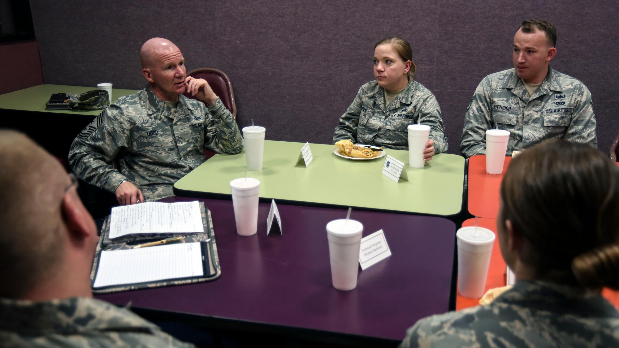 Chief Master Sergeant Thomas F. Good, Twentieth Air Force Command Chief, speaks with 377th Air Base Wing junior NCOs at the Kirtland Lanes bowling alley, July 18. Good discussed ways to better take care of airmen and their families across the command and listened to ideas pitched by the NCOs. (U.S. Air Force Photo/Senior Airman Chandler Baker)