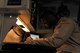 U.S. Air Force Staff. Sgt. Jeremy McCray, 105th Airlift Wing C-17 Globemaster III loadmaster, fills out a log before take-off at a patient move on Ramstein Air Base, Germany, July 13, 2017. 105th AW Airmen stationed at Stewart Air National Guard Base, New York, were part of the flight crew who transported the injured service members back to the United States. (U.S. Air Force photo by Airman 1st Class D. Blake Browning)