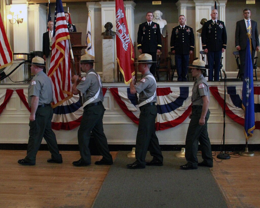 Park Rangers with the New England District color guard retire the colors during the New England District change of command ceremony, July 19, 2017 at the historic Faneuil Hall in Boston, Mass. The reviewing party consisted of U.S. Army Maj. Gen. Kent Savre, commanding general, Maneuver Support Center of Excellence and Fort Leonard Wood, Mo.; U.S. Army Col. William Conde , the incoming district engineer and commander of New England District, U.S. Army Col. Christopher Barron, the outgoing district commander, and Mr. Scott Acone, the deputy district engineer for Project Management, New England District, U.S. Army Corps of Engineers. (U.S. Army photo by Diallo Ferguson/Released)