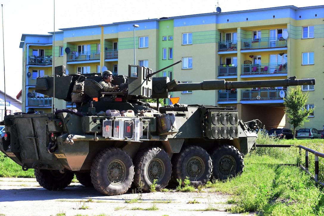A Stryker crew assigned to the 2nd Squadron, 4th Cavalry Regiment, provides security during the Bull Run exercise in Suwalki, Polsand, July 16, 2017. Battle Group Poland tested its readiness and interoperability as part of NATO's enhanced Forward Presence. Army photo by Sgt. 1st Class Patricia Deal