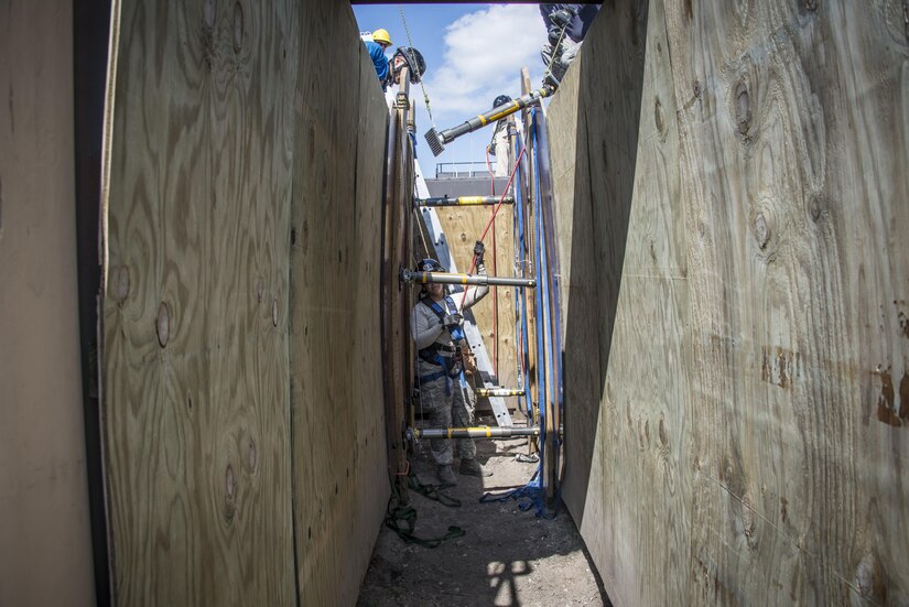 Air National Guard and Army National Guard personnel use a technique known as shoring to stabilize a structure during Patriot North, a domestic operations disaster-response training exercise conducted by National Guard units working with federal, state and local emergency management agencies and first responders at the REACT Center at Volk Field, Wis., July 17, 2017. Air National Guard photo by Air Force Master Sgt. Kellen Kroening