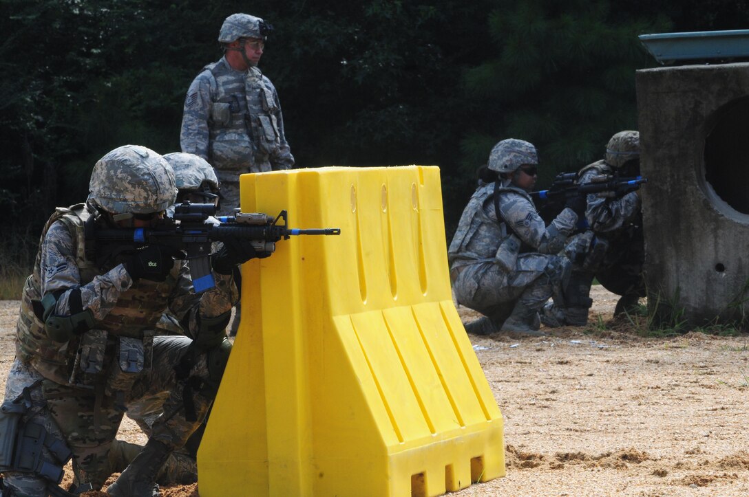 A Member of the 916th Security Forces Squadron provides cover fire down range during “shoot, move and communicate” training on July 16, 2017, at Seymour Johnson Air Force Base, North Carolina. (U.S. Air Force photo by Senior Airman Jeramy Moore)