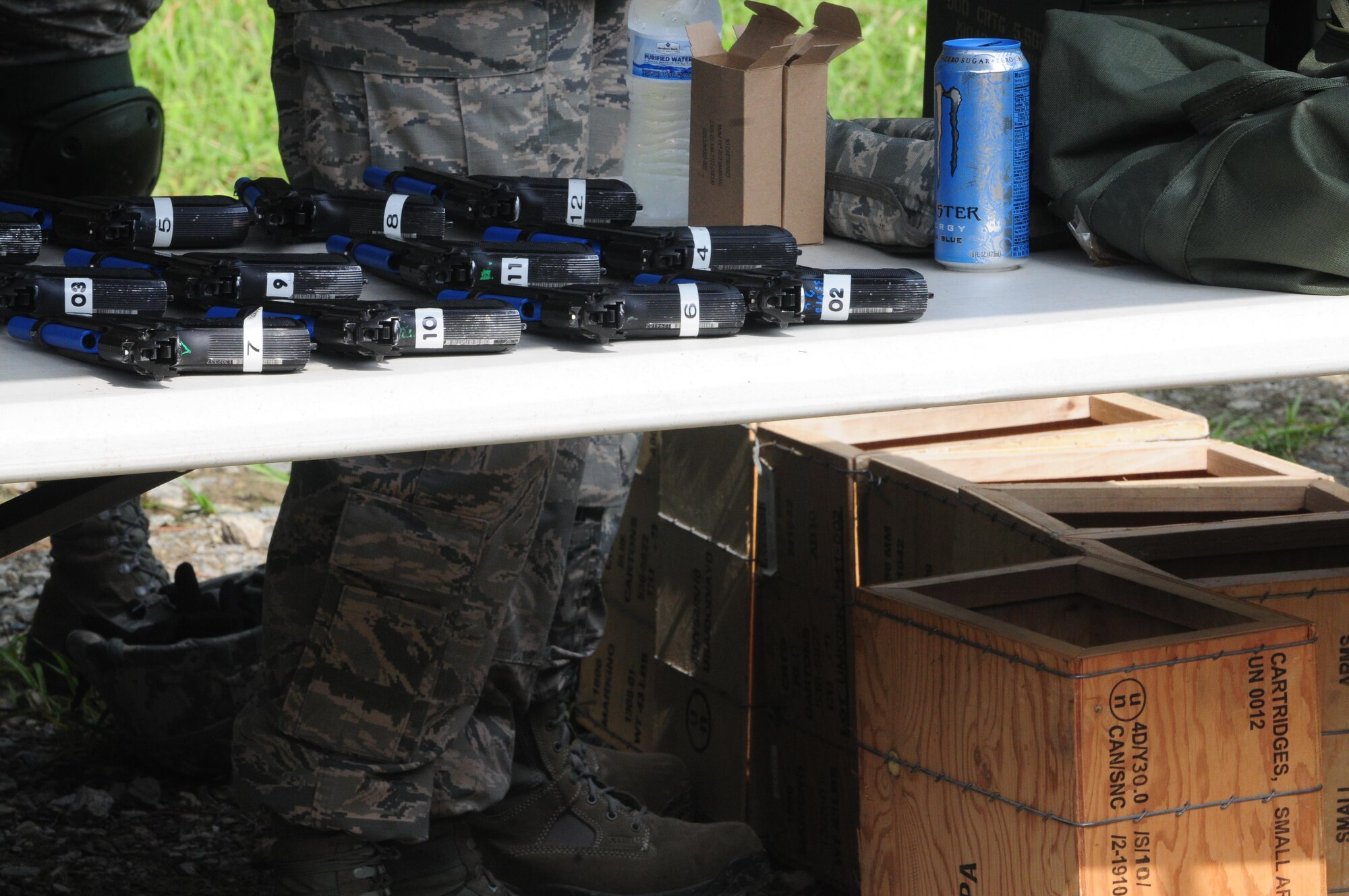 Members of the 916th Security Forces Squadron prepare training firearms for the “shoot, move and communicate” training on July 16, 2017, at Seymour Johnson Air Force Base, North Carolina. (U.S. Air Force photo by Senior Airman Jeramy Moore)