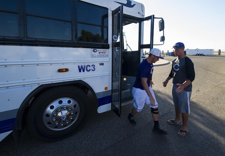 Clovis High School football players step off a bus during their tour at Cannon Air Force Base, NM, July 19, 2017. The high school students took a brief tour through the 26th STS facility and were quickly put to the test as they performed exercises that Joe instructed them to do. (U.S. Air Force photo by Senior Airman Lane T. Plummer)