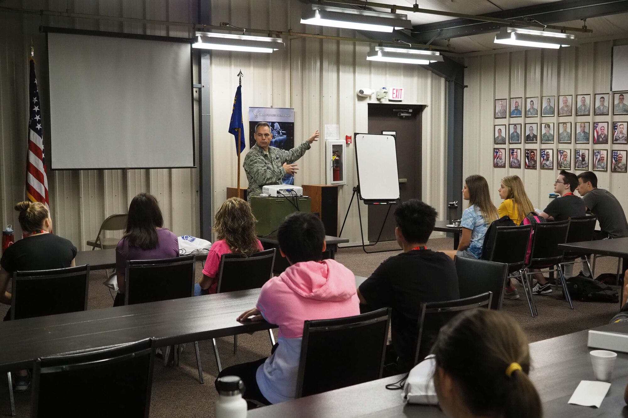 Col. Tony Polashek, 934th Airlift Wing commander, talks with Students from the Aviation Career Education (ACE) camp to kick off their week-long training at the Minneaplis-St. Paul Air Reserve Station July 16.  The camp is sponsored by the FAA and Minnesota Dept. of Transportation for high school students interested in aviation careers. (Air Force Photo/Paul Zadach) 