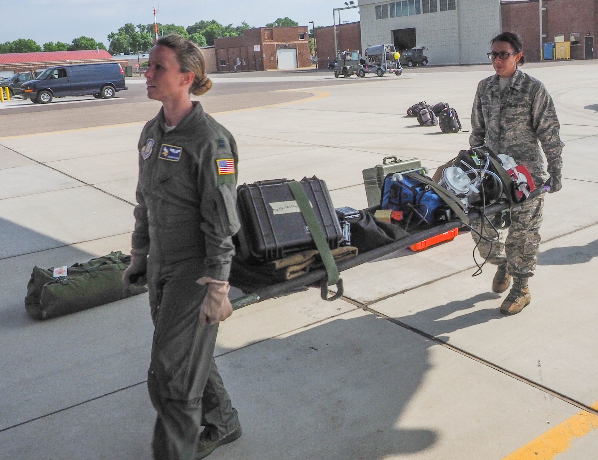 Members of the 934th Aeromedical Evacuation Squadron train aboard a 934th Airlift Wing C-130 flight July 16.  The squadron provides worldwide in-flight medical care. (Air Force Photo/Paul Zadach)