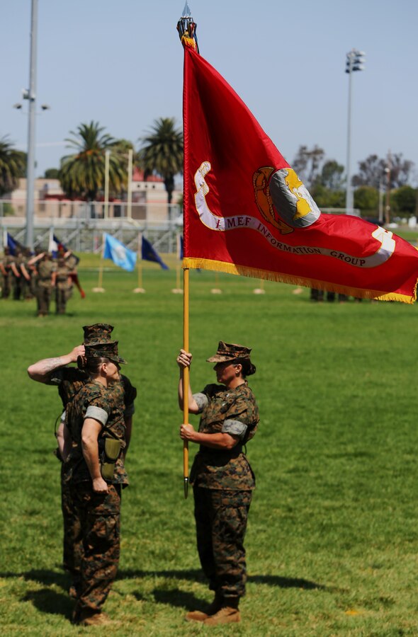 Col. Bobbi Shea (right) relinquishes the I Marine Expeditionary Force Information Group colors to Col. Dawn R. Alonso (left) during a change of command and re-designation ceremony at Camp Pendleton, Calif., July 6, 2017. During the ceremony I MEF Headquarters Group was re-designated as I MEF Information Group to support I MEF in the expanding information environment. (U.S. Marine Corps photo by Lance Cpl. Robert A Alejandre)
