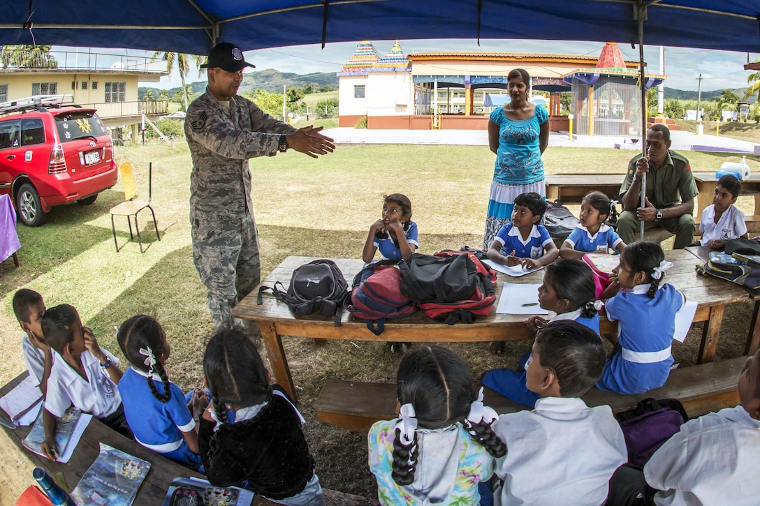 Air Force Staff Sgt. Angelo Corpuz shows Fijian students how to wash their hands to prevent the spread of germs and disease at the Tagitagi Sangam School and Kindergarten in Tavua, Fiji, July 17, 2017. Air Force photo by Tech. Sgt. Benjamin W. Stratton
