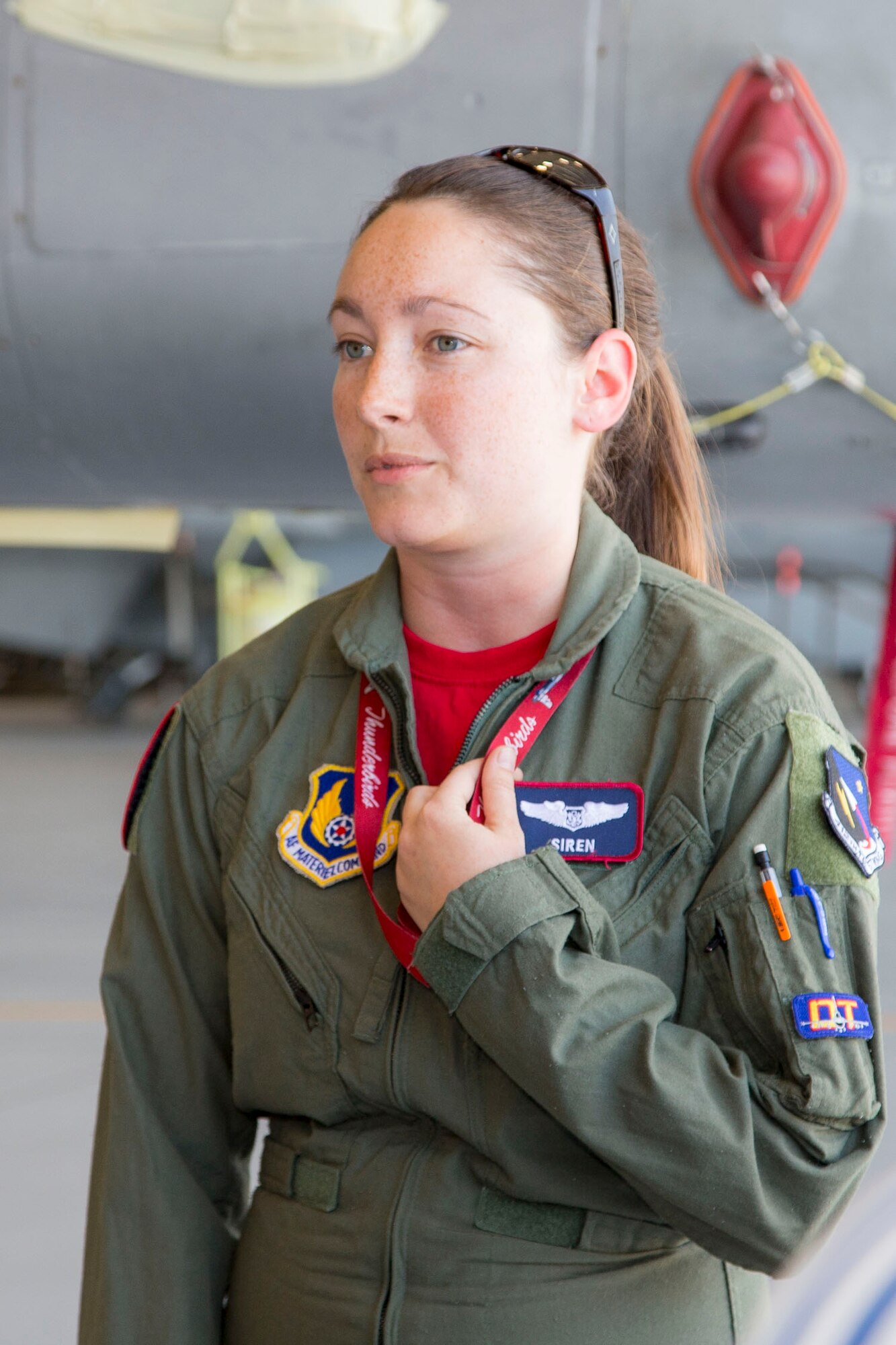 Lacy Anderson, 416th Flight Test Squadron flight test engineer, speaks to young women and their famlies during a Tech Trek Camp tour to the squadron last month. (U.S. Air Force photos by Christopher Okula)
