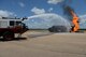 Col. William Denham, 14th Flying Training Wing Vice Commander, watches from the passenger seat of a T-19 Stryker as a fireman puts out a simulated aircraft fire July 17, 2017, on Columbus Air Force Base, Mississippi. Fire Protection uses the metal aircraft to simulate a crash and practices their emergency procedures. (U.S. Air Force photo by Airman 1st Class Keith Holcomb)
